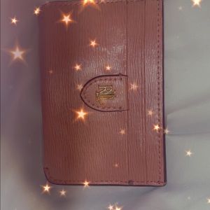 Tommy Hilfiger card holder dont need it have a bunch